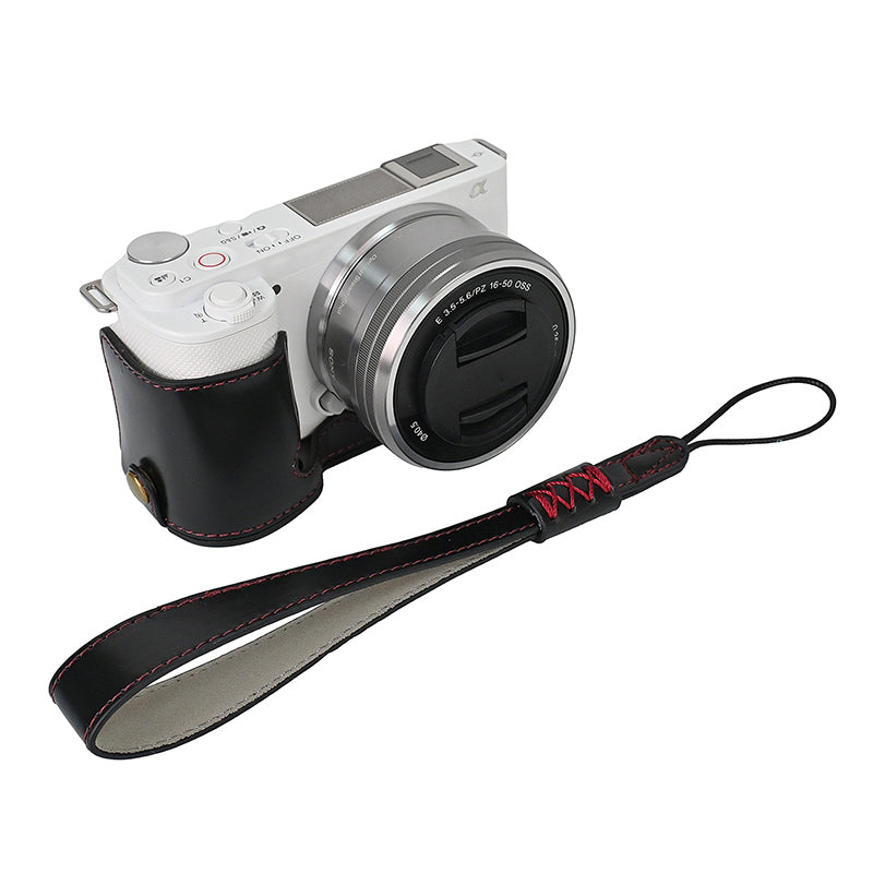 For Sony ZV-E10 Battery Opening Design PU Leather Camera Cover Half Body Bottom Case with Wrist Strap For Sony ZV-E10 Battery Opening Design PU Leather Camera Cover Half Body Bottom Case with Wrist Strap
